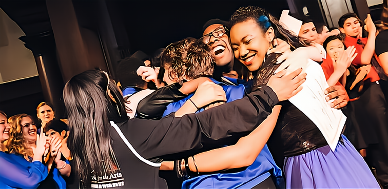 OSA Students celebrating and hugging